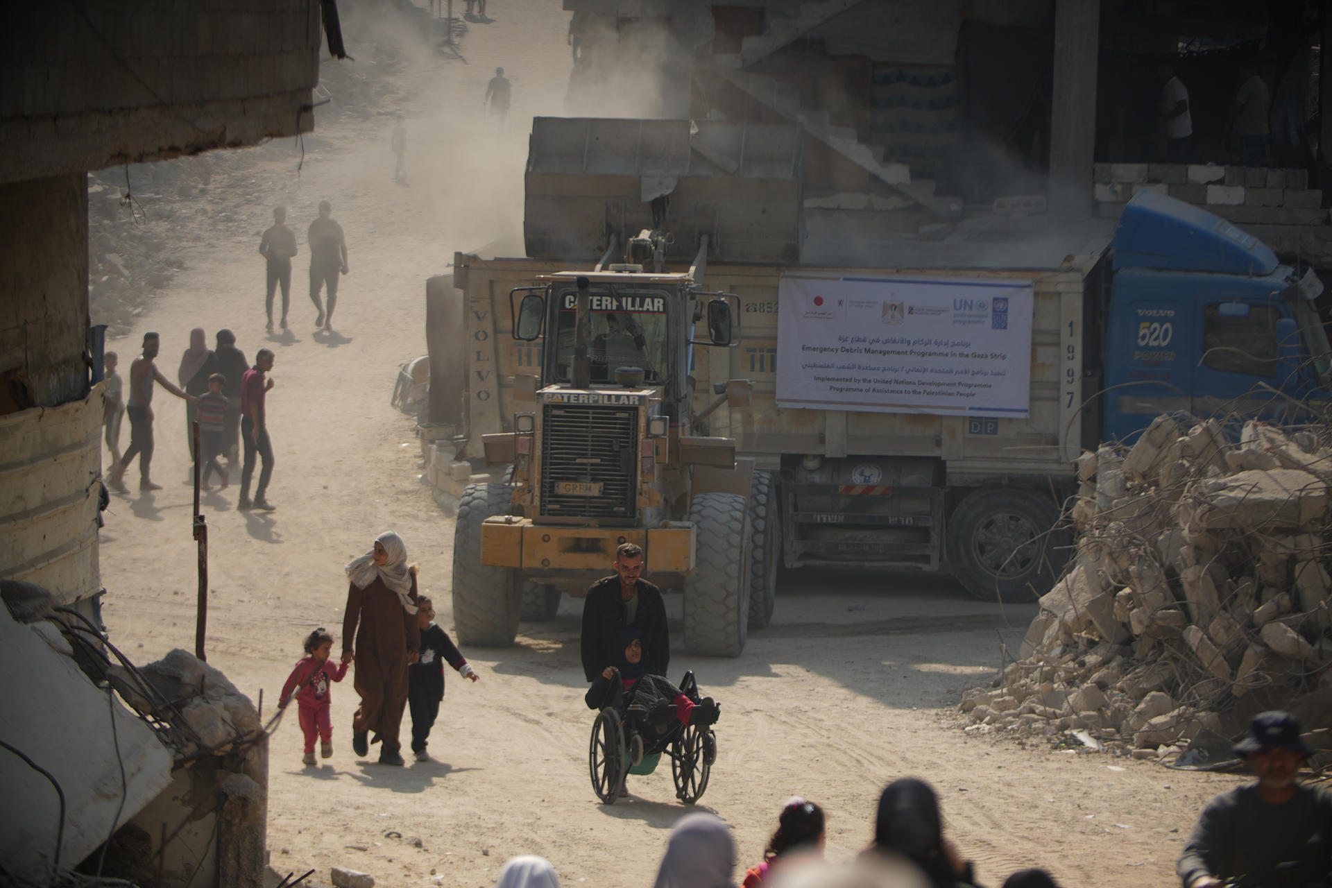 UNDP rubble-removal work on a damaged street in Gaza